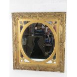 A late 18th/early 19thC gilt wood and plaster square shaped wall mirror,