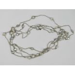 A vintage white metal necklace set with moonstone cabachons (one stone deficient possibly having