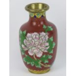 An early 20thC Chinese cloisonné Canton enamel bud vase having pink and blue floral decoration upon,