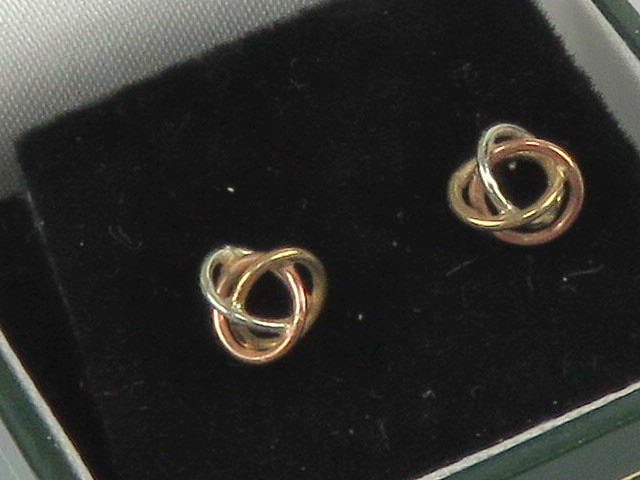 A pair of 9ct gold tri-colour Russian Knot style stud earrings, hallmarked 375,