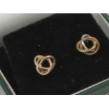 A pair of 9ct gold tri-colour Russian Knot style stud earrings, hallmarked 375,