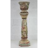 A Capodimonte planter and stand having classical column form with figures upon,