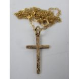 A 9ct rose gold crucifix on 9ct gold chain necklace,