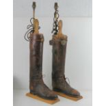A rare pair of brown leather WWI British Officers boots having two cap badges upon,