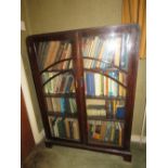 A c1930s twin door Art Deco glazed cabinet or bookcase, 90 x 25 x 125cm.