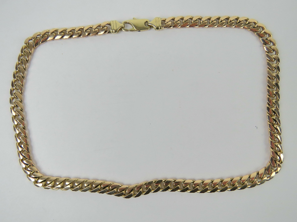 A substantial 9ct gold curb link chain necklace, 52.5cm in length, 8mm wide, hallmarked 375, 77.5g.