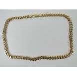 A substantial 9ct gold curb link chain necklace, 52.5cm in length, 8mm wide, hallmarked 375, 77.5g.