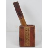 Liberty of London; a leather covered letter opener and desk tidy,
