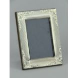 An HM silver photograph frame, overall size 6.5 x 8.5cm.