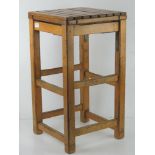 A pine stool having slatted seat, 35 x 35 x 63.5cm.