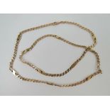 A substantial and unusual 9ct gold necklace having sections of curb link chain separated by