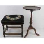 A mahogany wine table raised over tripod feet, together with a four legged embroidery footstool.