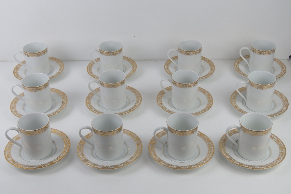 A set of twelve contemporary cream groun