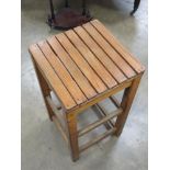 A pine stool having slatted seat, 35 x 3