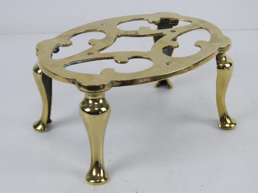 A good brass footman raised over four legs, 20cm wide, - Image 2 of 4