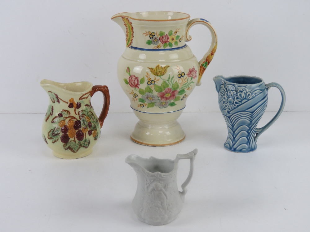 Four assorted decorative jugs inc Portme