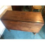 A Victorian mahogany drop leaf table hav