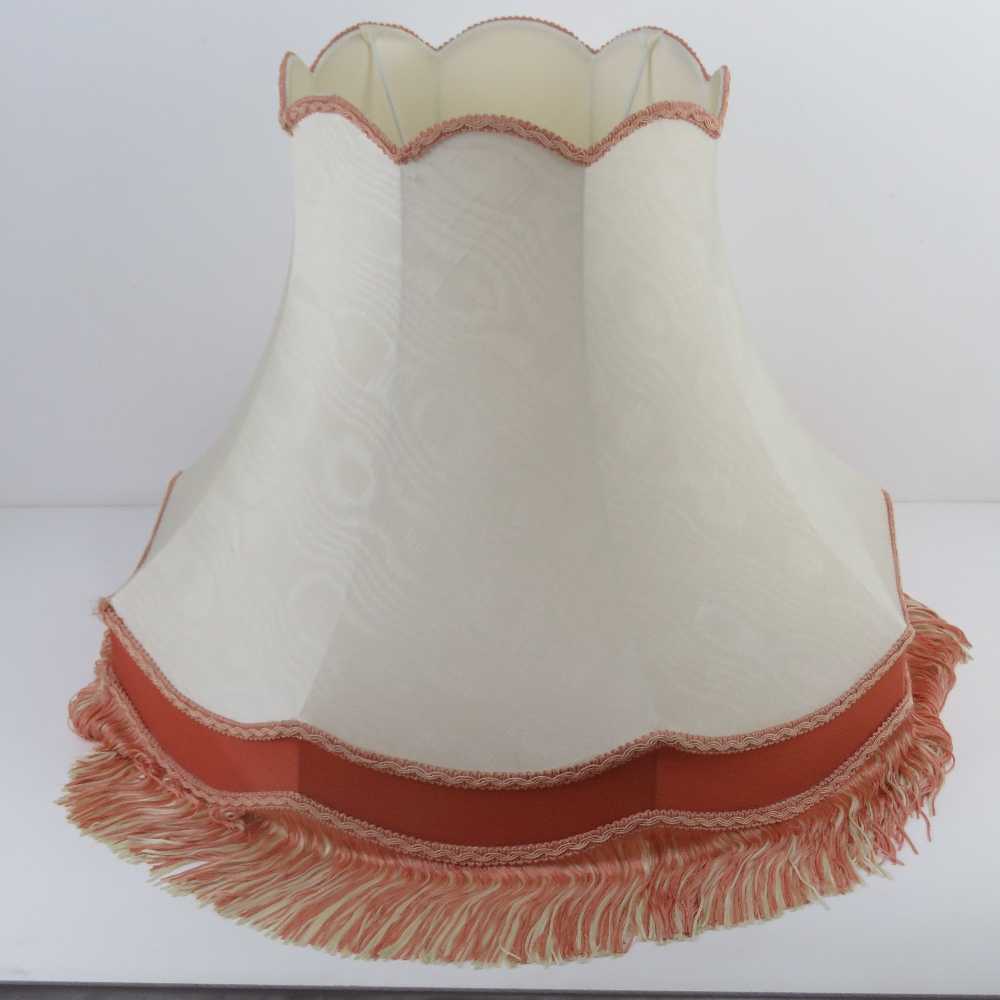 A silk lamp shade in cream and pink, 54c