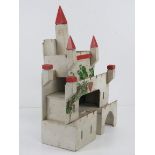 A vintage hand made castle dolls house,