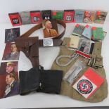 A quantity of assorted military themed and reproduction military items;