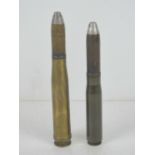 Two inert German 20mm shells, having marks upon.