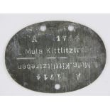 A WWII German dog tag for L Mula Luftwaffe.