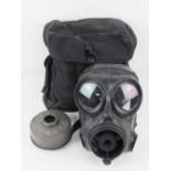 A Pakistan Pak 10 gas mask and bag.