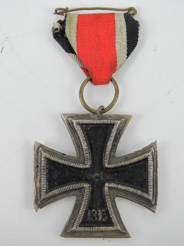 A reproduction WWII German Iron Cross with ribbon. - Image 2 of 2