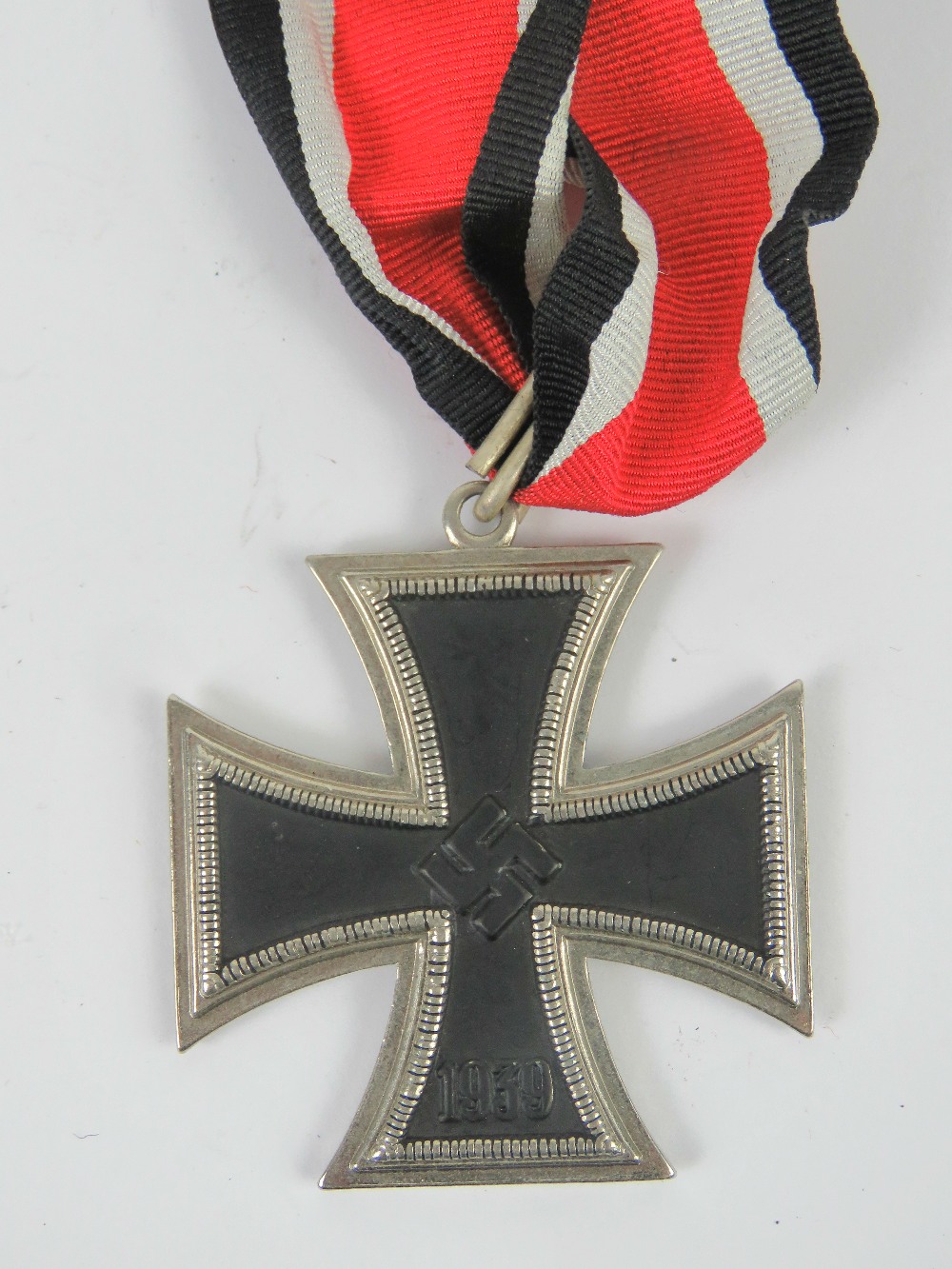A reproduction WWII German Iron Cross medal.