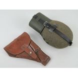 A German P38 holster together with a WWII German water bottle.