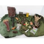 Assorted militaria including kit bags, pouches, oil bottles, holster, truncheon.