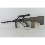 A deactivated Steyr Aug. SN M17752.