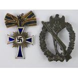 A WWII German Assault badge, together with a Mothers Cross.