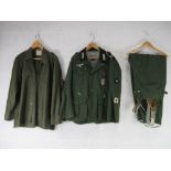 A German Combat Jacket with insignia, size 46, German Combat shirt size 46.