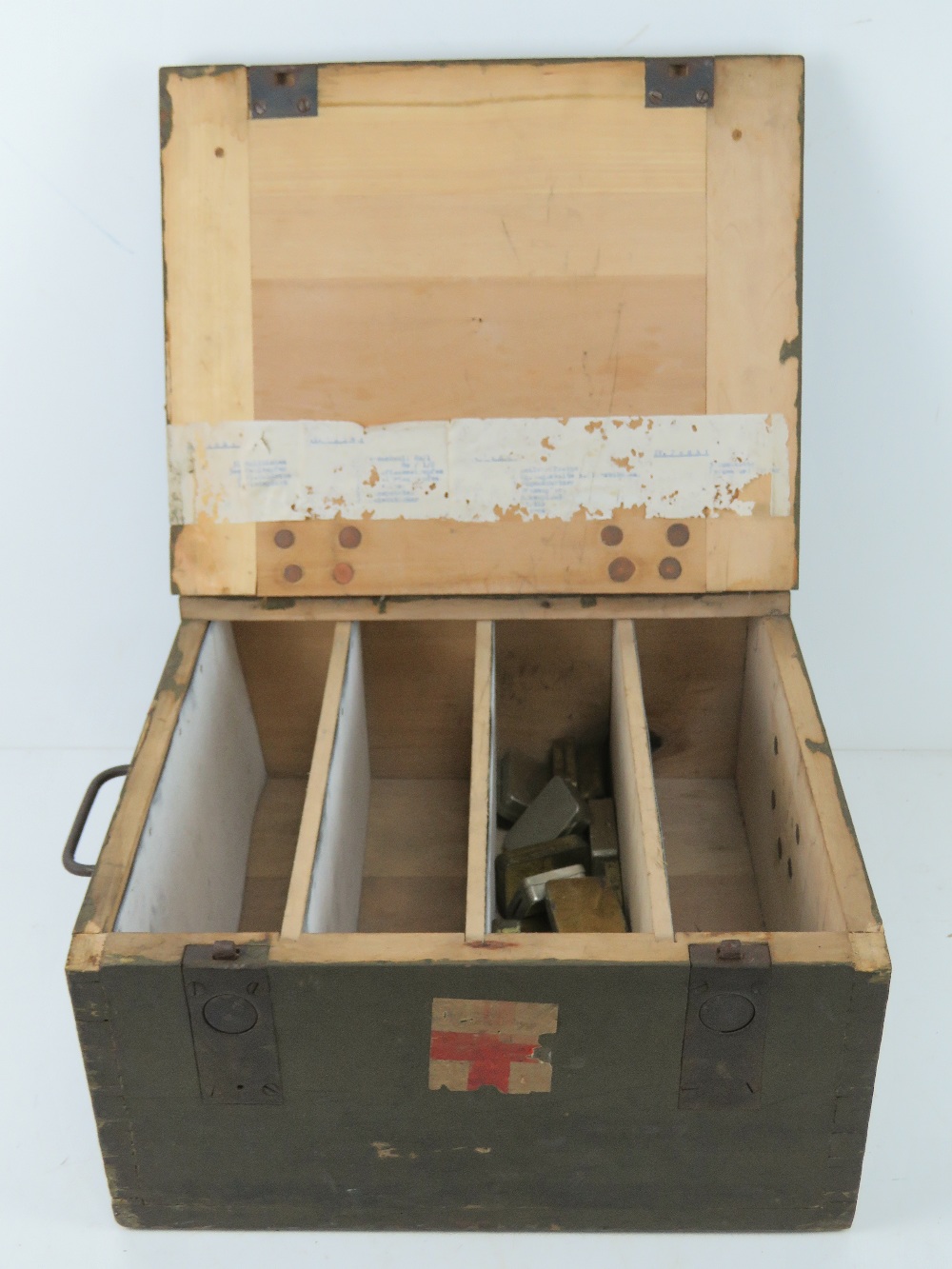 A German wooden medical box with some contents.