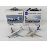 Two Scandinavian Airlines 1;200 scale mo