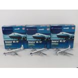 Three Douglas DC-7C 1;200 scale die cast