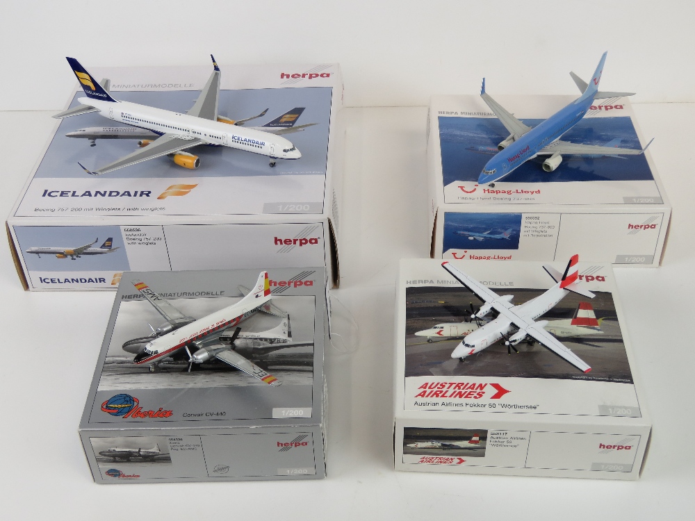 Four 1/200 scale model aircraft by Herpa