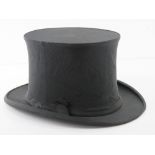 A vintage collapsible top hat by Austin Reed Regent Street, approx size 6.75.