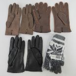 A pair of mens driving gloves, together