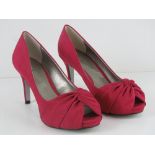 A pair of hot pink peep toe Jacques Vert