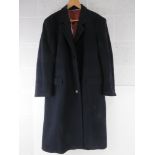 A men's wool and cashmere coat made in Italy, navy blue with burgundy lining approx 48" chest.