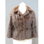 A vintage fur jacket bearing label for Smith & Sons Ltd Northampton,