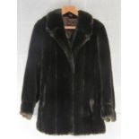 A faux fur jacket approx 40" chest, 31"