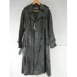 A black leather ladies trench coat 40" chest.