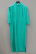 A green 3/4 length tunic dress, no label