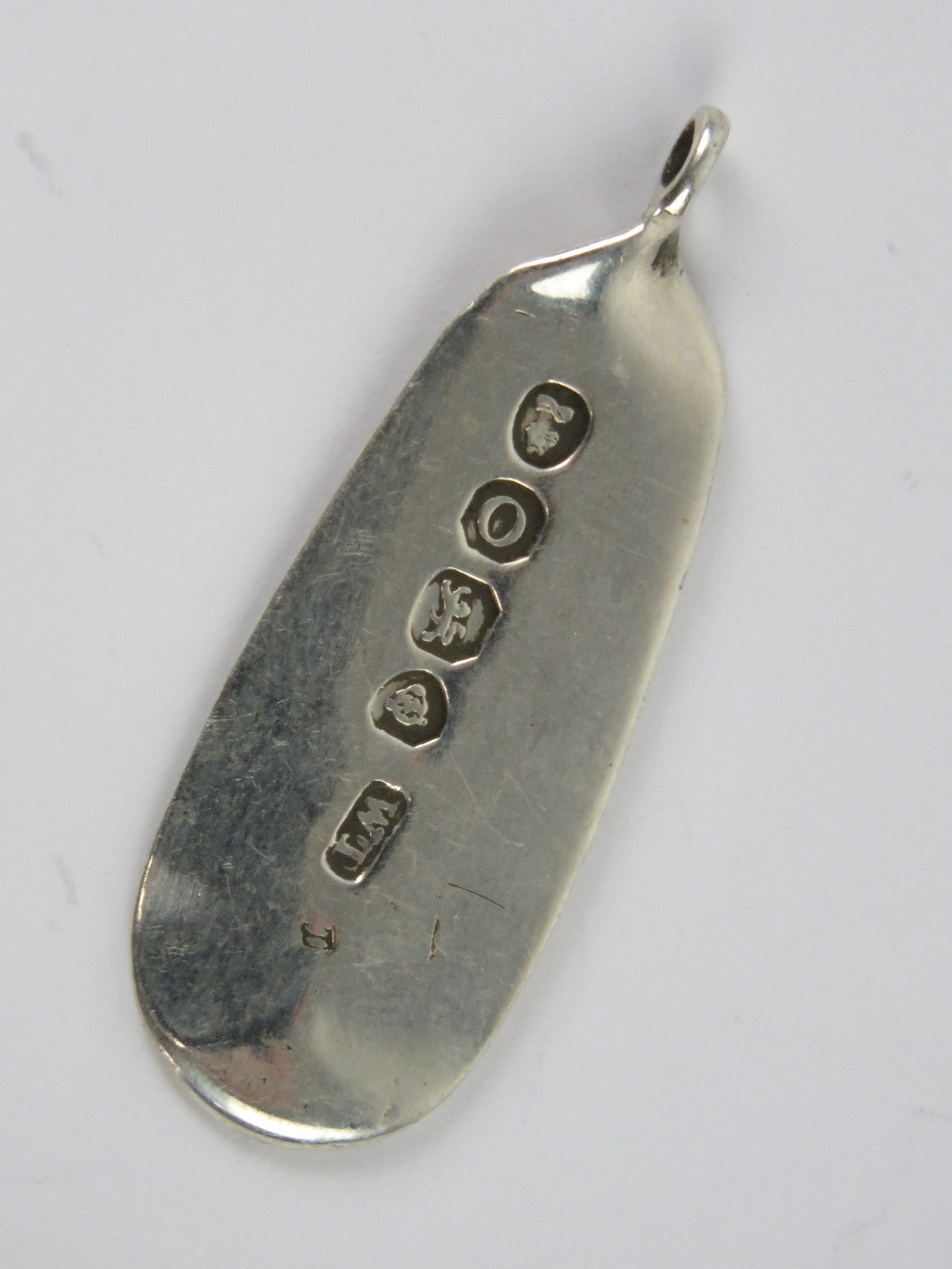 An unusual handmade spoon pendant made f