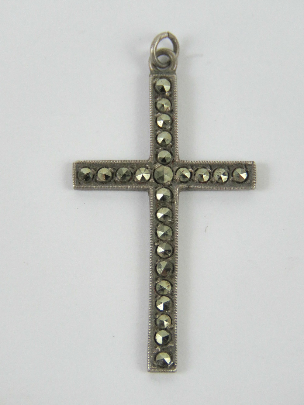 A silver and marcasite cross or crucifix