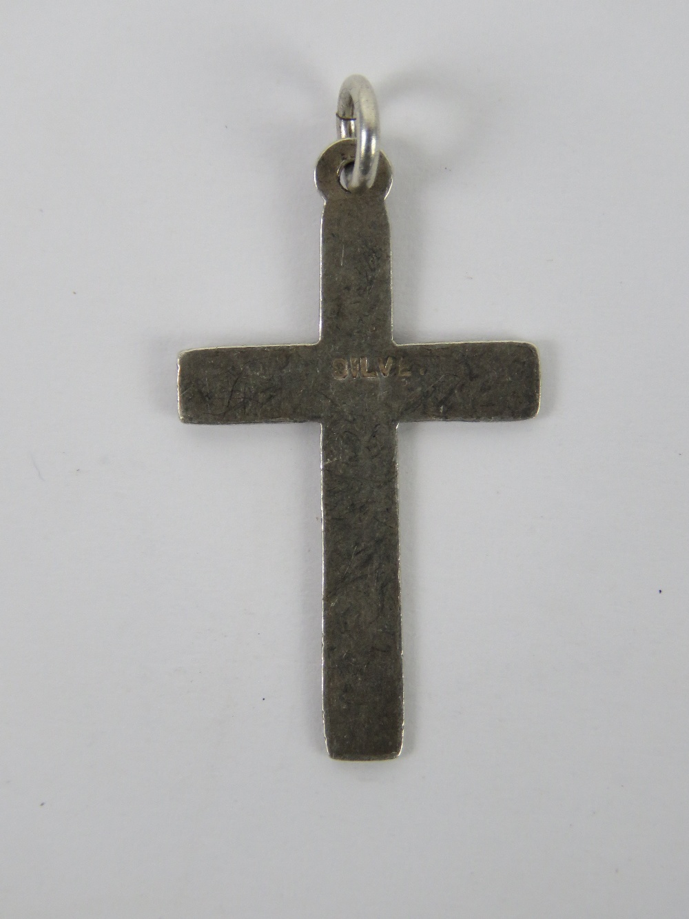 A silver crucifix pendant having scrolli - Image 2 of 3