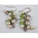 A pair of pearl and gemstone cluster ear